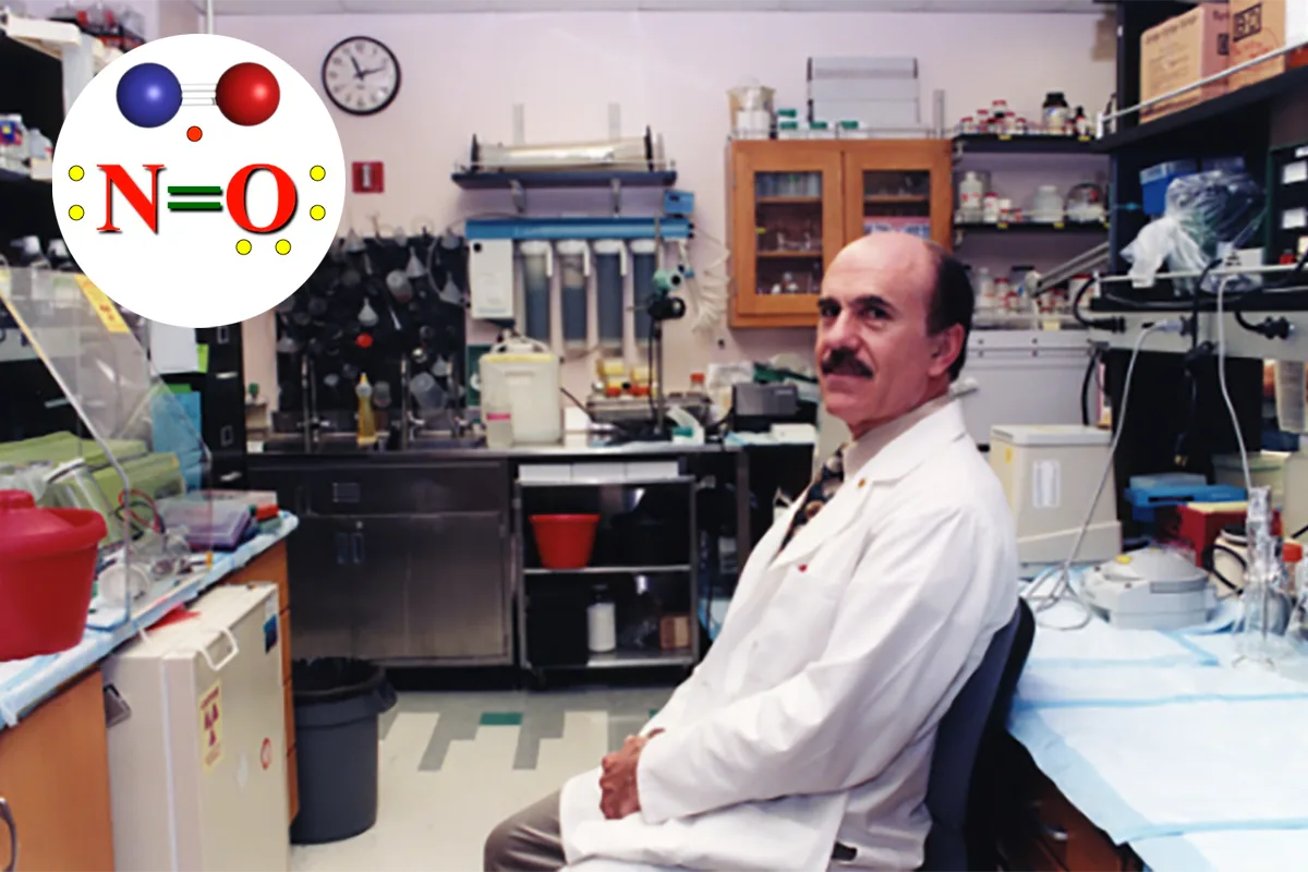 Dr. Lou Ignarro in the laboratory where nitric oxide was studied, with a nitric oxide (N=O) molecule graphic